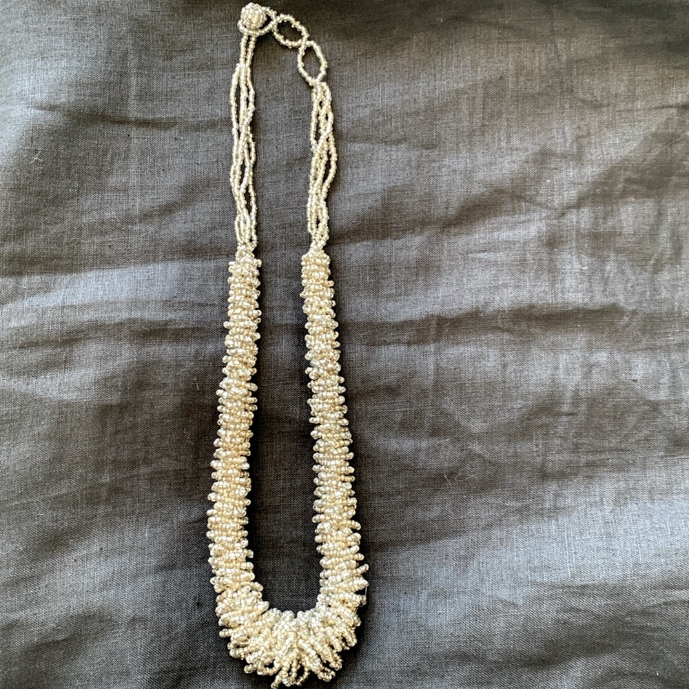 Beaded long necklace. Silver beads.